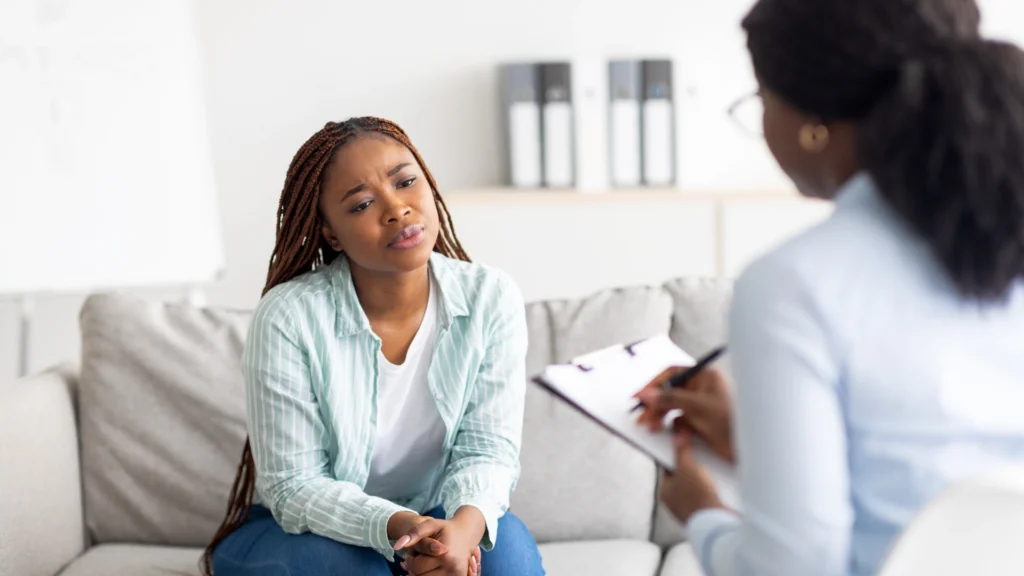 A woman taking her therapist session